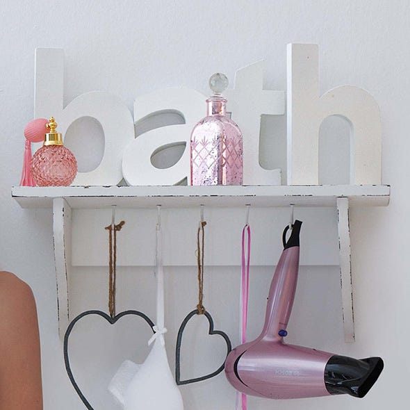 Product, Pink, Shelving, Shelf, Clothes hanger, Peach, Plastic, Home accessories, Still life photography, Paint, 