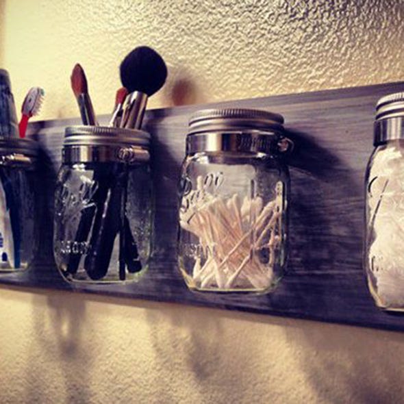 Food storage containers, Mason jar, Drinkware, Chemical compound, Lid, Home accessories, Seasoning, Still life photography, Silver, Cookie jar, 