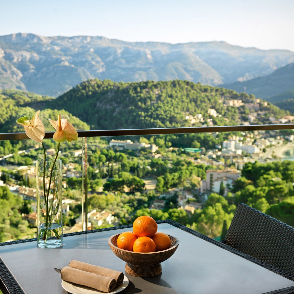 Mountainous landforms, Fruit, Ingredient, Tangerine, Citrus, Mountain range, Table, Tableware, Orange, Mountain, 