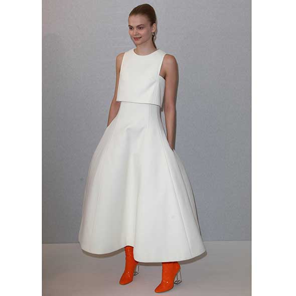 Clothing, Dress, Sleeve, Shoulder, Textile, Photograph, Joint, Standing, Formal wear, One-piece garment, 