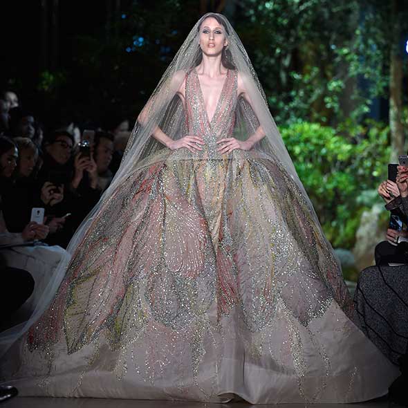 Dress, Gown, Fashion, Costume design, Fashion model, Haute couture, Veil, Embellishment, Wedding dress, Bridal clothing, 