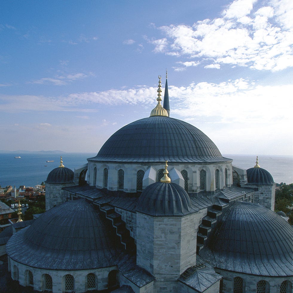 Dome, Cloud, Dome, Landmark, Finial, Place of worship, Byzantine architecture, Holy places, Historic site, Roof, 