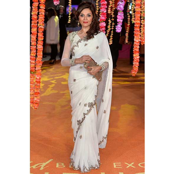 Textile, Flooring, Fashion, Neck, Gown, Tradition, Necklace, Fashion design, Fashion model, Peach, 