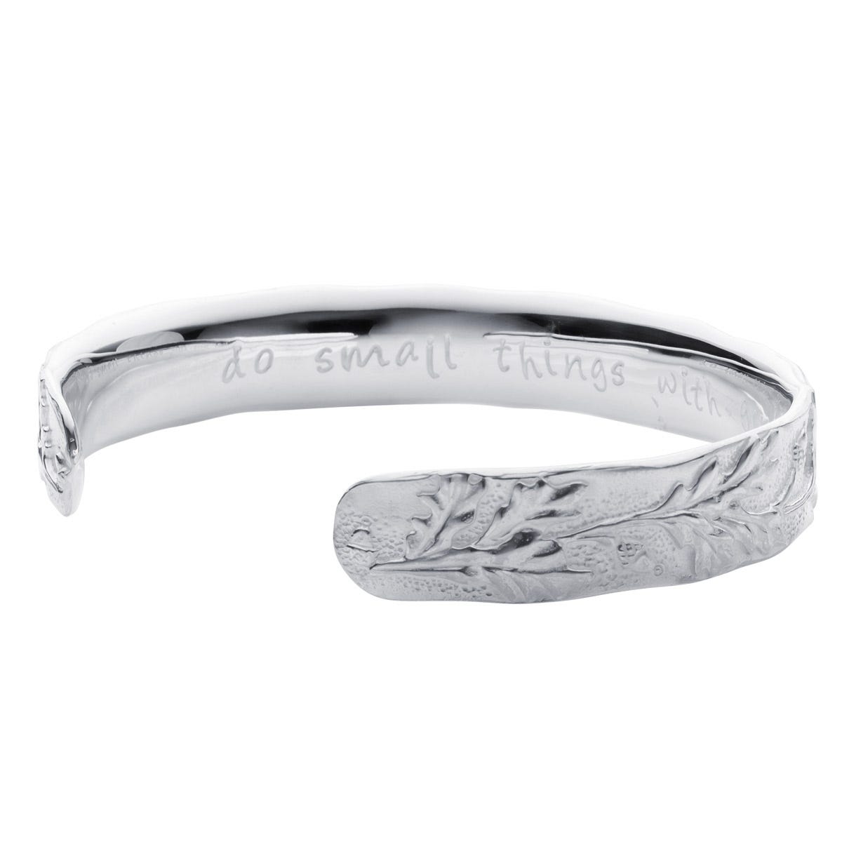 White, Fashion accessory, Jewellery, Font, Ring, Natural material, Metal, Mineral, Silver, Body jewelry, 