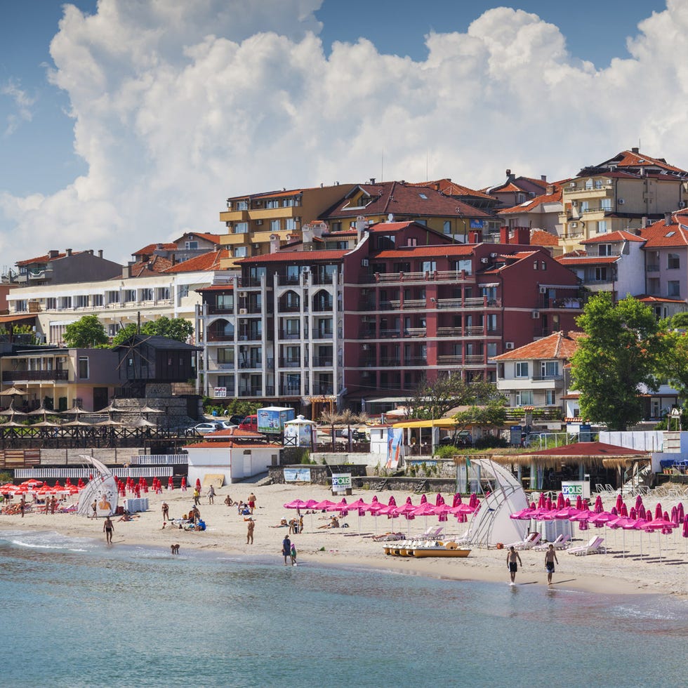 Body of water, Coastal and oceanic landforms, Shore, Tourism, People on beach, Coast, Neighbourhood, Town, Summer, Beach, 
