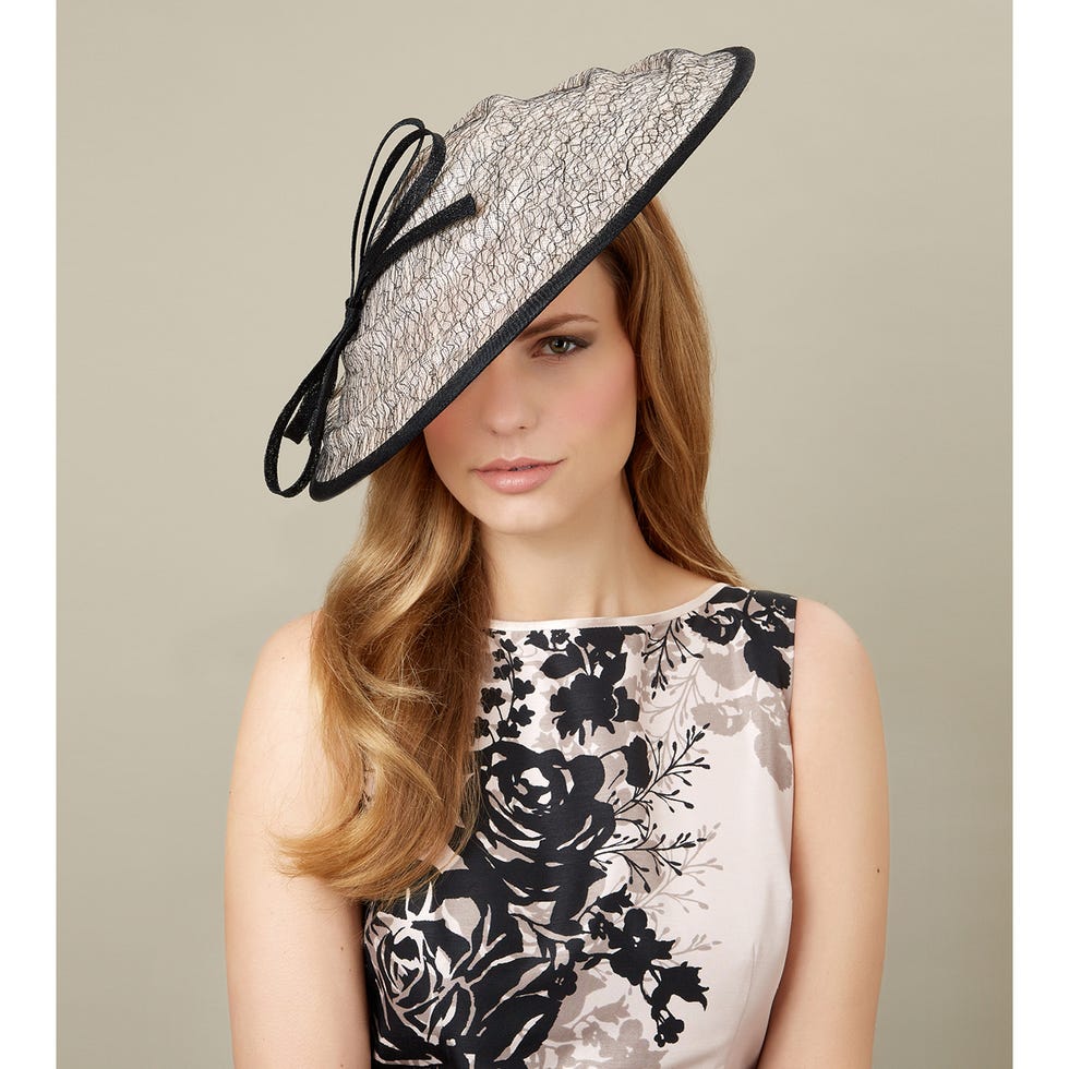 Lip, Shoulder, Hat, Headgear, Costume accessory, Beauty, Fashion, Cool, Street fashion, Day dress, 