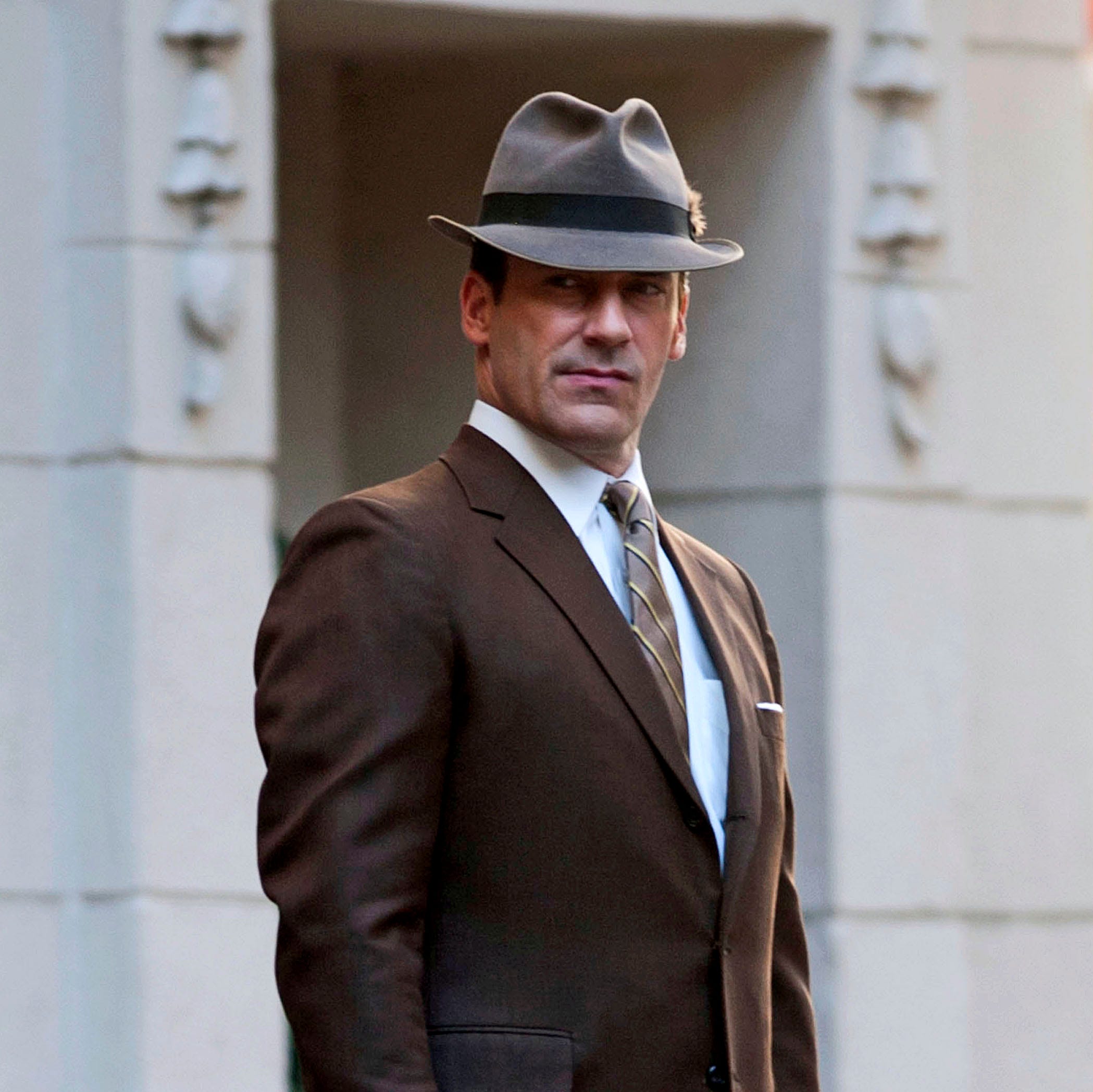 Clothing, Coat, Hat, Dress shirt, Collar, Sleeve, Shirt, Suit, Standing, Outerwear, 