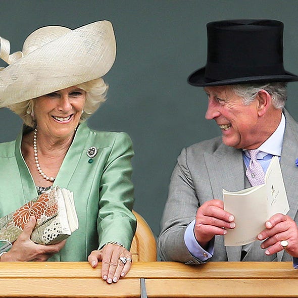 Clothing, Smile, Hat, Coat, Hand, Outerwear, Happy, Fashion accessory, Formal wear, Facial expression, 