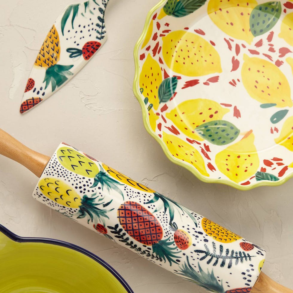 Yellow, Pattern, Art, Dishware, Creative arts, Kitchen utensil, Visual arts, Craft, Ceramic, Platter, 