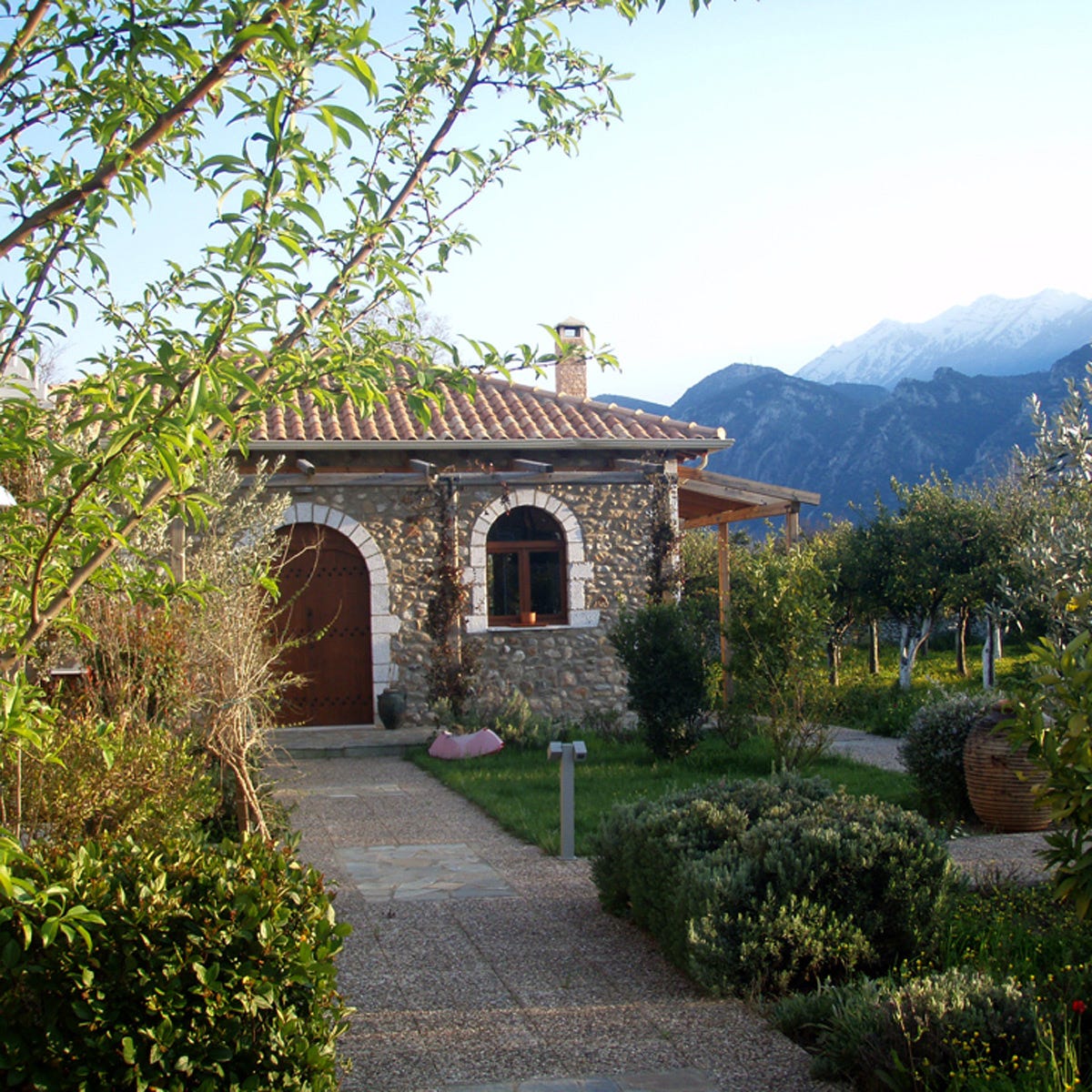 Plant, Shrub, Garden, House, Mountain range, Arch, Rural area, Door, Walkway, Hill station, 