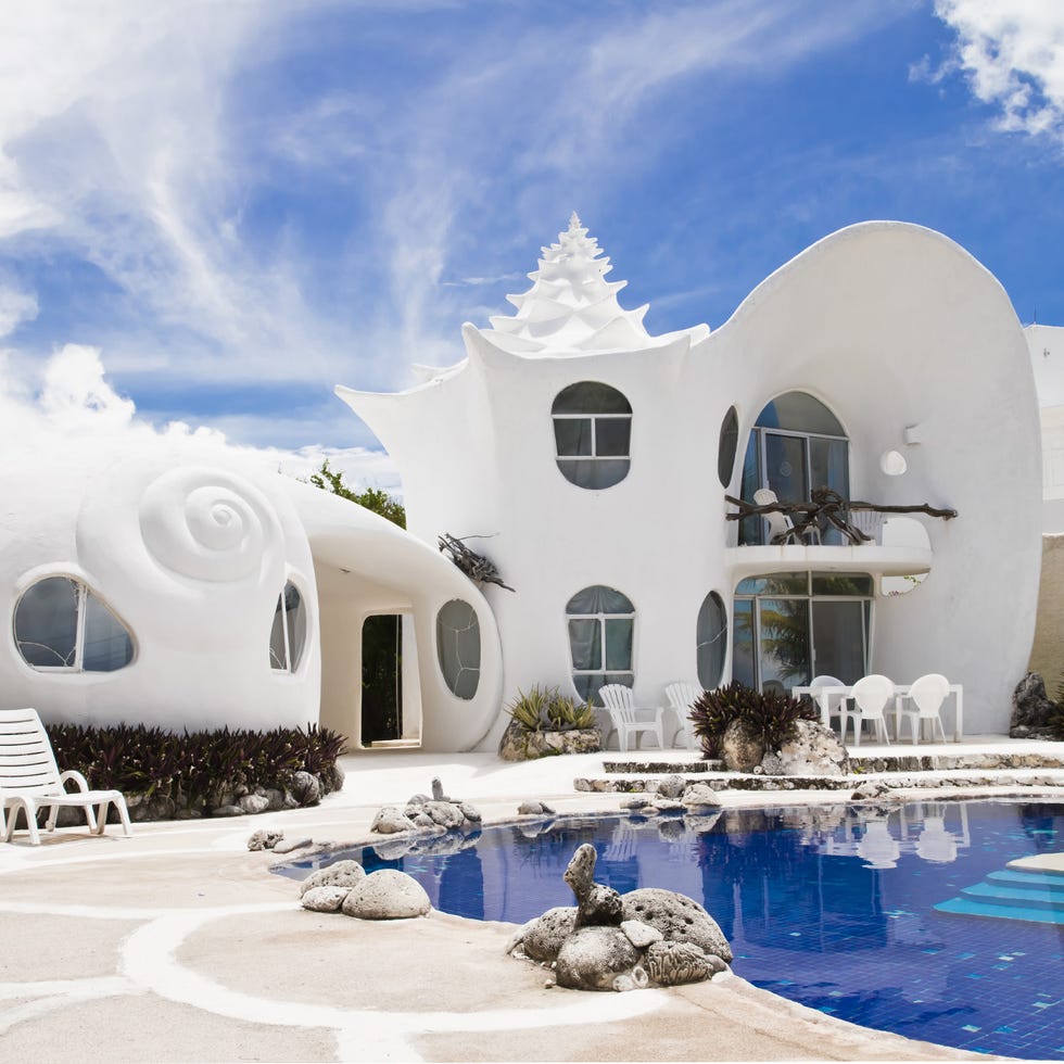 Architecture, Real estate, Swimming pool, House, Water feature, Design, Arch, Villa, Paint, Outdoor furniture, 