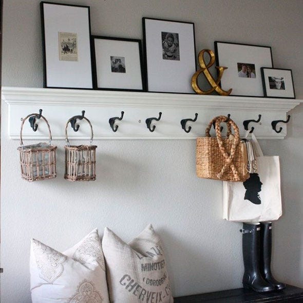 Room, Wall, Interior design, Interior design, Home accessories, Picture frame, Linens, Collection, Lamp, Still life photography, 