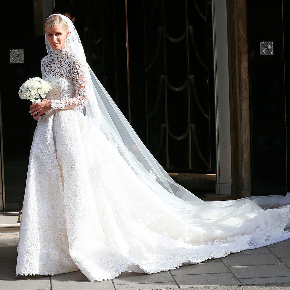 Clothing, Bridal clothing, Shoulder, Dress, Textile, Veil, Photograph, Bridal veil, White, Gown, 