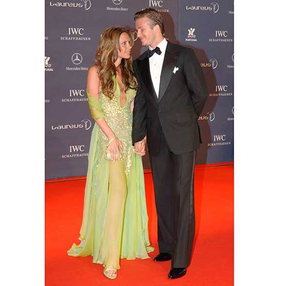 Clothing, Coat, Trousers, Event, Suit, Flooring, Dress, Outerwear, Formal wear, Carpet, 