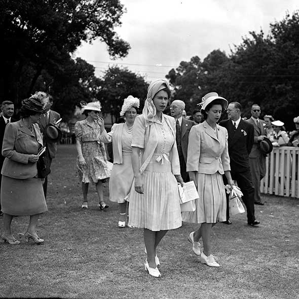 Standing, Monochrome, Mammal, Style, Monochrome photography, Black-and-white, Crowd, Vintage clothing, One-piece garment, Day dress, 
