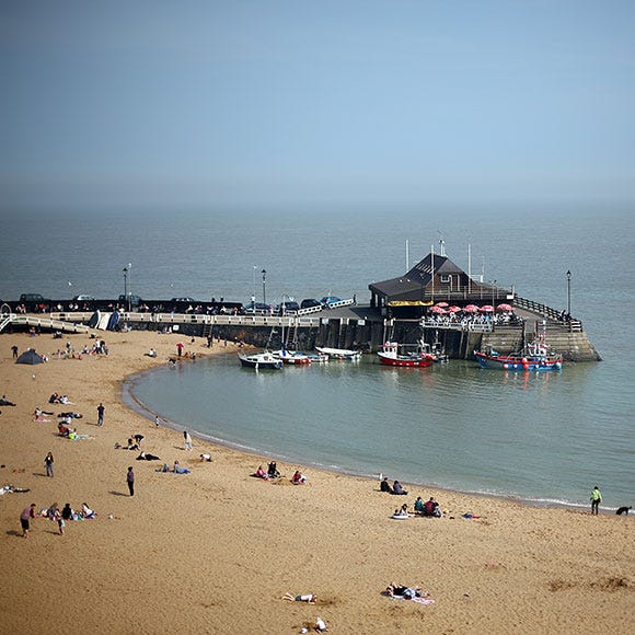 Body of water, Coastal and oceanic landforms, Coast, Shore, Tourism, Water, Sand, People on beach, Sea, Beach, 