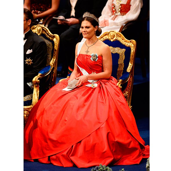 Human, Dress, Style, Formal wear, Gown, Fashion accessory, Crown, Fashion, Costume design, Tradition, 