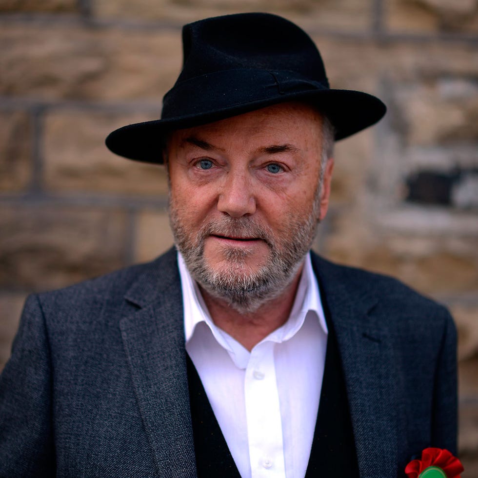 Clothing, Facial hair, Lip, Coat, Dress shirt, Hat, Chin, Collar, Eyebrow, Shirt, 