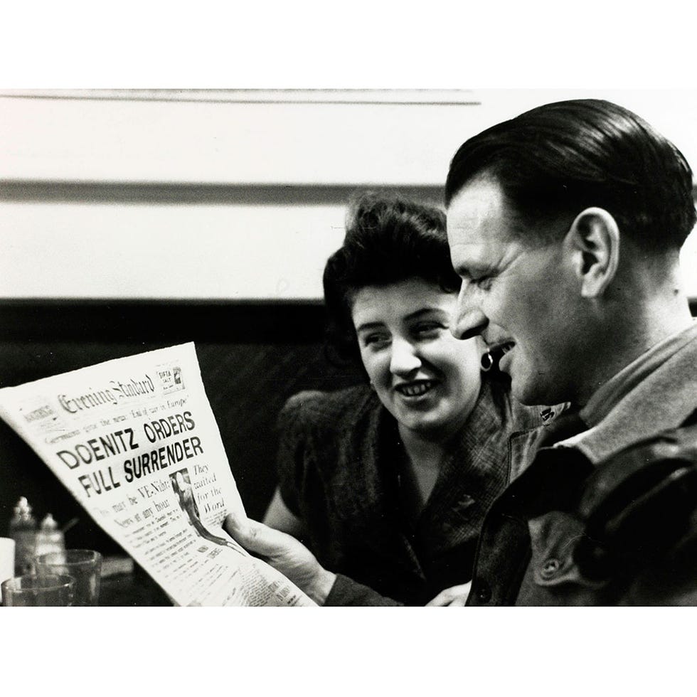 Happy, Facial expression, Reading, Publication, Love, Cup, Paper, News, Laugh, Paper product, 