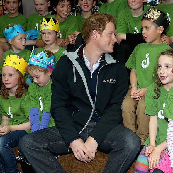 Face, Leg, People, Social group, Community, Headgear, Fan, Lap, Sweater, Celebrating, 