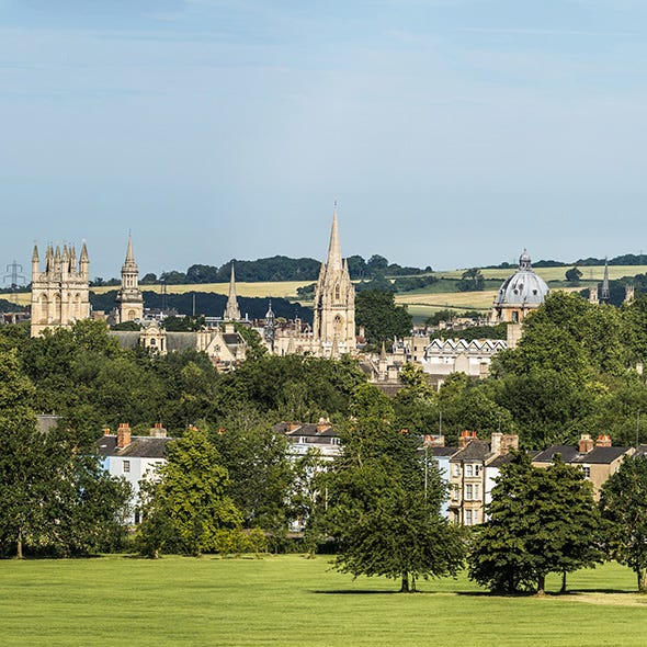 Spire, Steeple, Landmark, Lawn, Medieval architecture, Garden, Tower, Turret, Tourist attraction, Finial, 