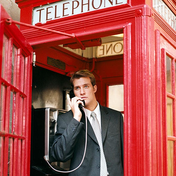 Coat, Dress shirt, Collar, Red, Suit, Outerwear, Microphone, Formal wear, Blazer, Telephone booth, 