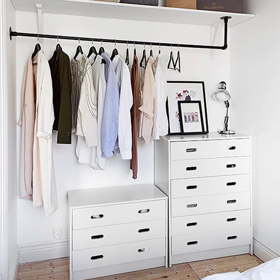 Blue, Wood, Room, Drawer, Chest of drawers, White, Interior design, Furniture, Cabinetry, Clothes hanger, 