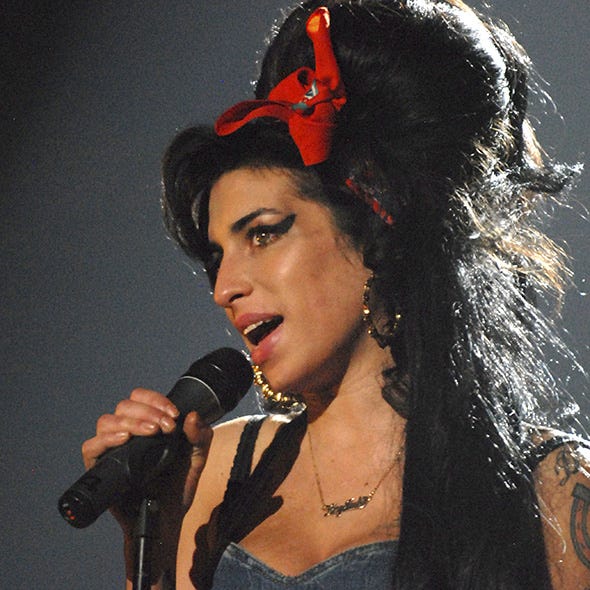 Audio equipment, Microphone, Nose, Hairstyle, Chin, Music, Music artist, Electronic device, Jewellery, Fashion accessory, 