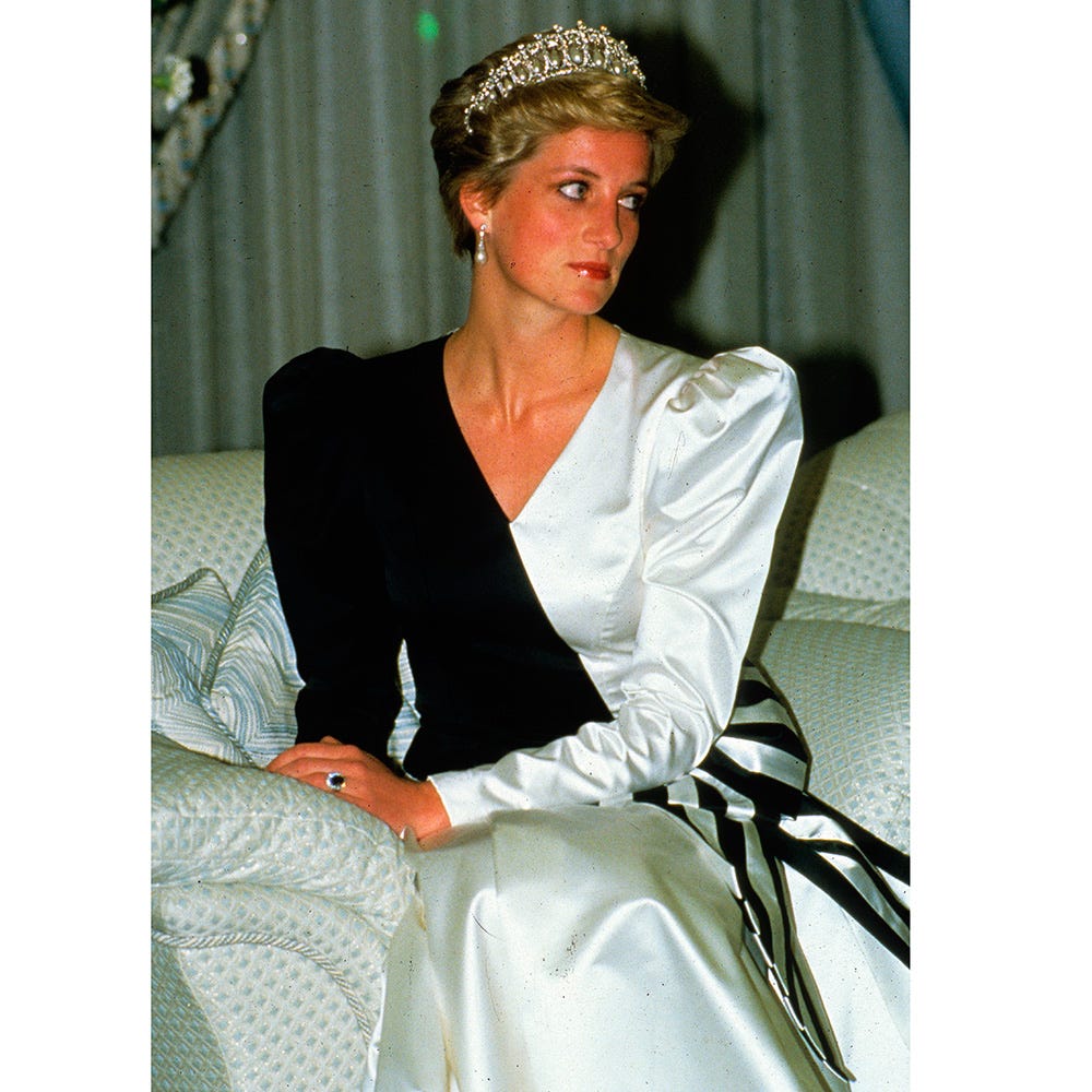 Textile, Headpiece, Headgear, Hair accessory, Fashion, Sitting, Tiara, Fashion design, Fashion model, Model, 