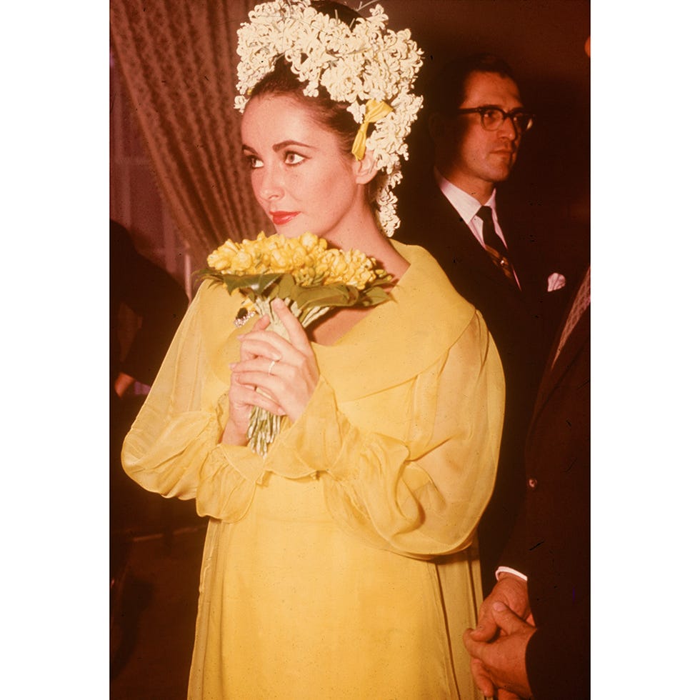 Petal, Yellow, Bouquet, Flower, Coat, Cut flowers, Floristry, Flower Arranging, Floral design, Flowering plant, 