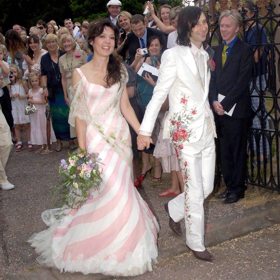 Clothing, People, Petal, Event, Coat, Trousers, Shirt, Bridal clothing, Photograph, Suit, 