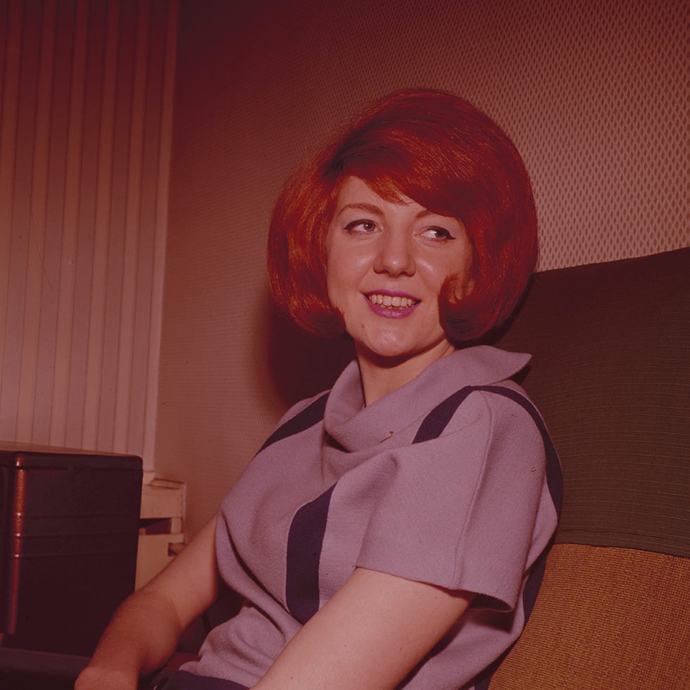 Lip, Red, Red hair, Curtain, Tooth, Bangs, Couch, Wig, Bob cut, Hair coloring, 