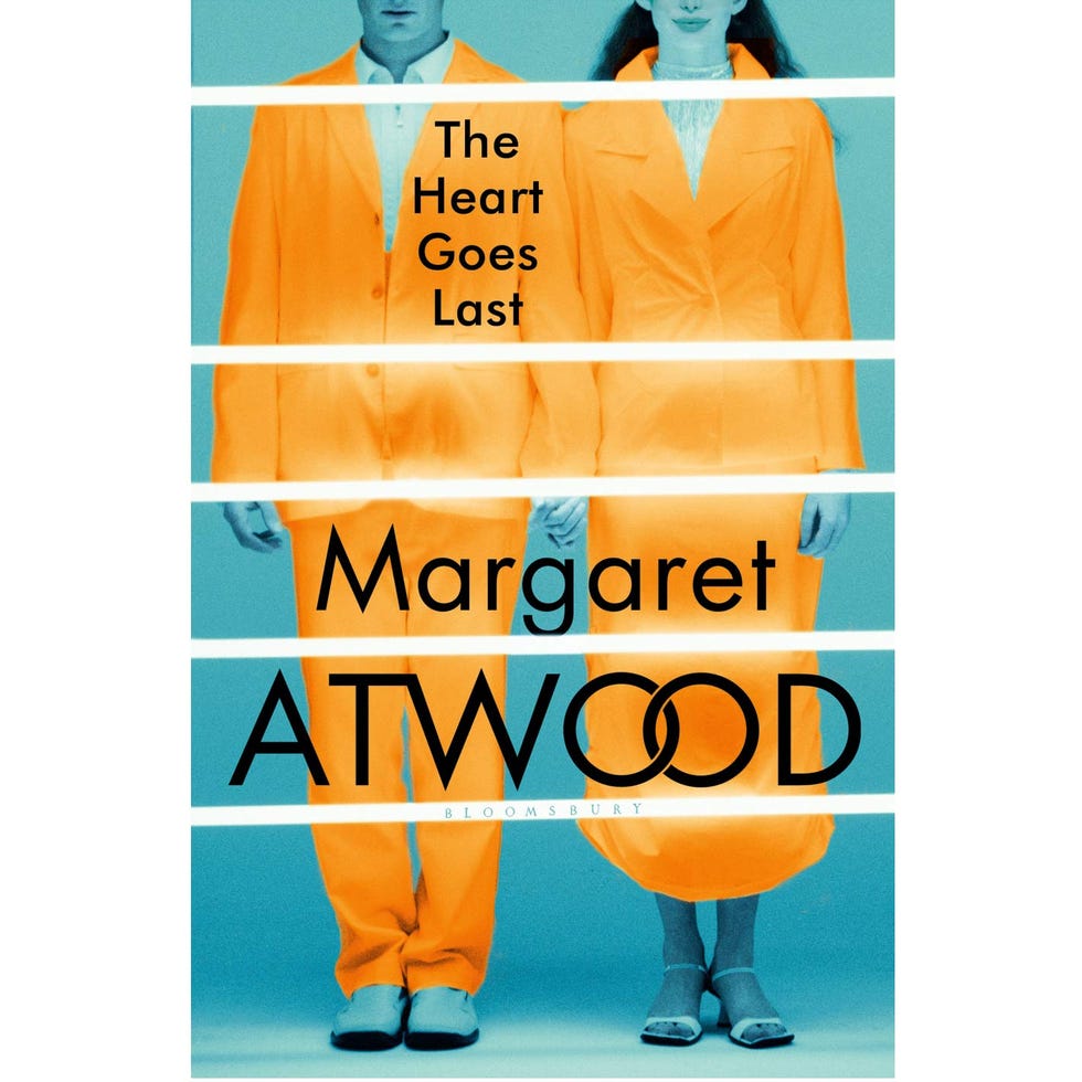 Yellow, Sleeve, Orange, Font, Advertising, Graphics, Fedora, Photo caption, Workwear, 
