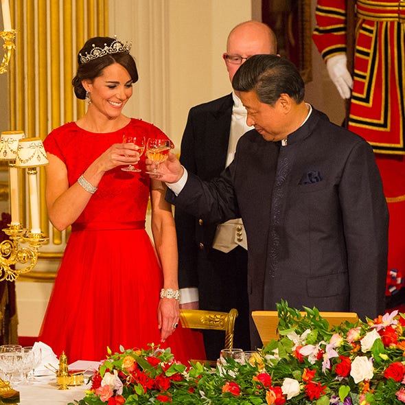 Event, Petal, Outerwear, Coat, Red, Dress, Suit, Formal wear, Bouquet, Tradition, 