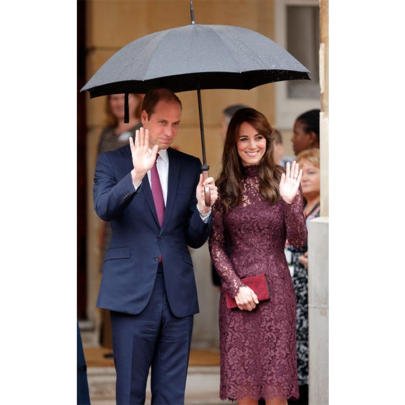 Clothing, Coat, Trousers, Suit trousers, Collar, Shirt, Dress, Standing, Umbrella, Photograph, 