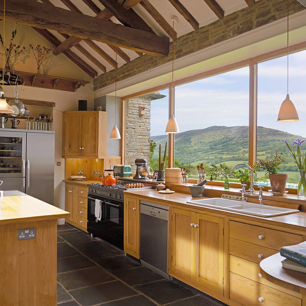 Wood, Room, Interior design, Property, Cupboard, Countertop, Floor, Ceiling, Cabinetry, Light fixture, 