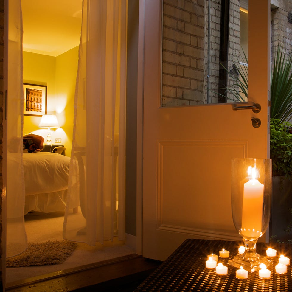 Lighting, Property, Room, Interior design, Wall, Amber, Interior design, Candle, House, Bed, 