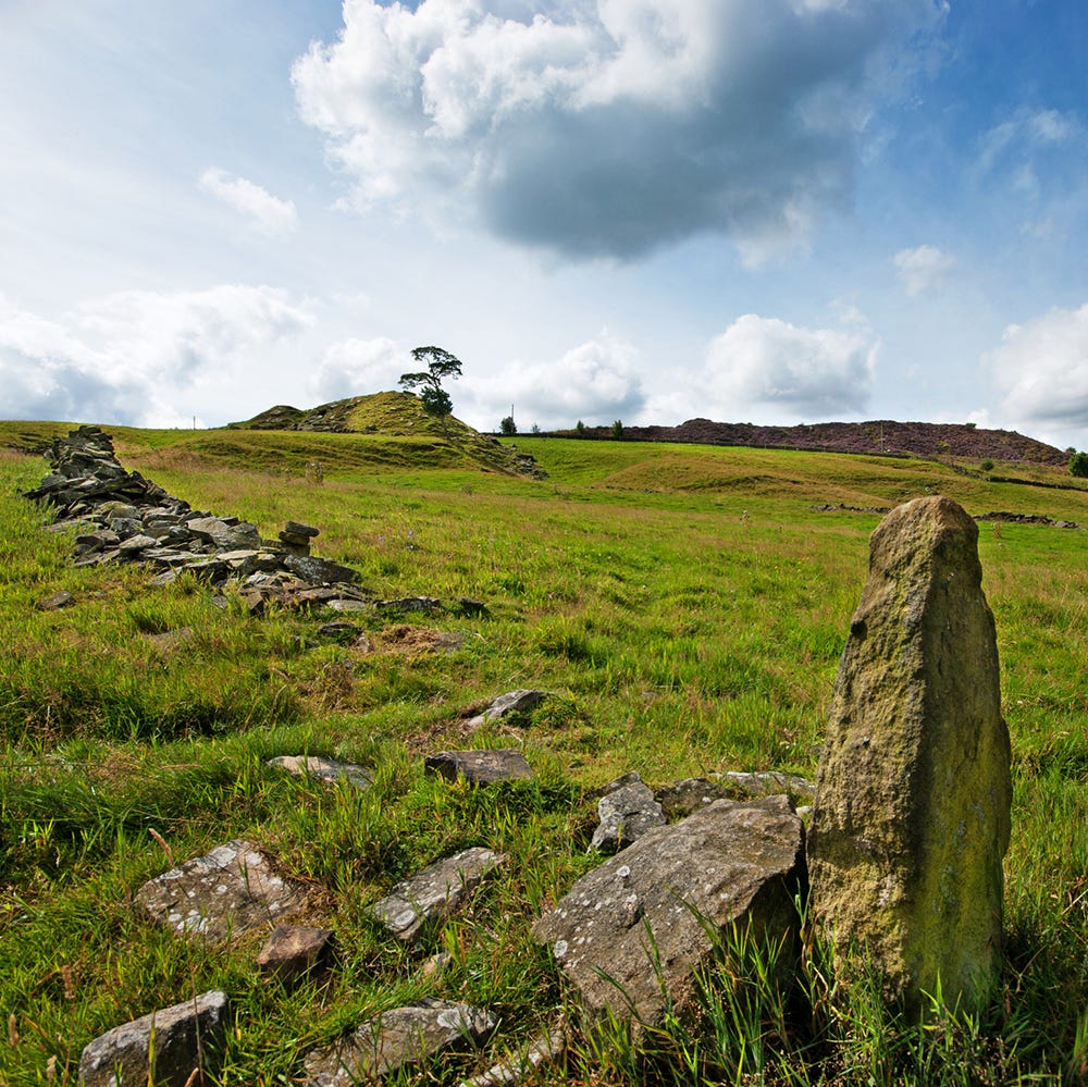 Cloud, Rock, Natural landscape, Landscape, Grassland, Bedrock, Land lot, Plain, Pasture, Hill, 