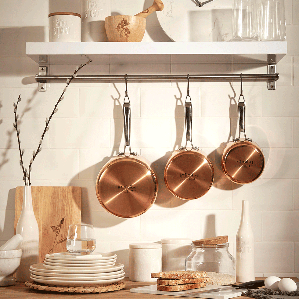 Copper, Pot rack, Room, Furniture, Metal, Home accessories, Interior design, Interior design, Beige, Kitchen, 