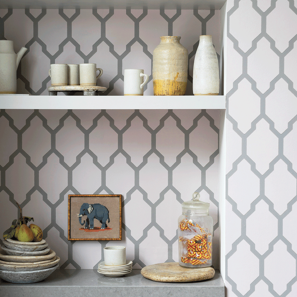 Shelf, Yellow, Room, Wall, Furniture, Wallpaper, Interior design, Tile, Glass bottle, Shelving, 