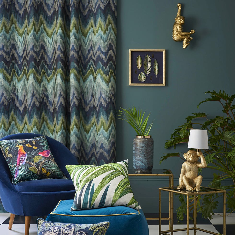 Blue, Living room, Green, Room, Interior design, Furniture, Couch, Yellow, Wall, Wallpaper, 