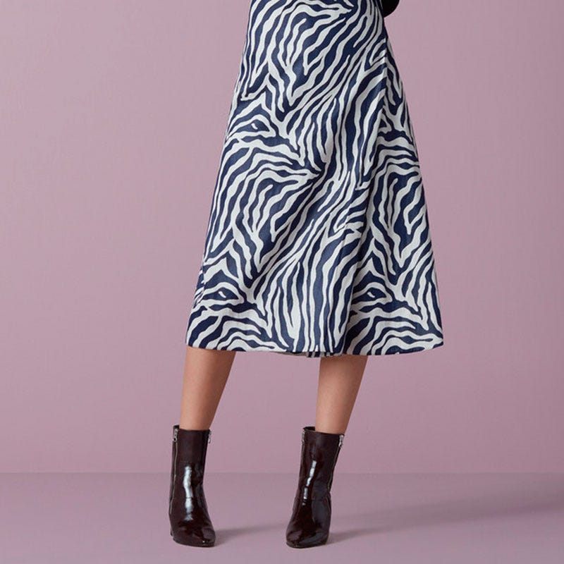 Textile, Style, Dress, Street fashion, Pattern, Fashion, One-piece garment, Knee, Day dress, Boot, 