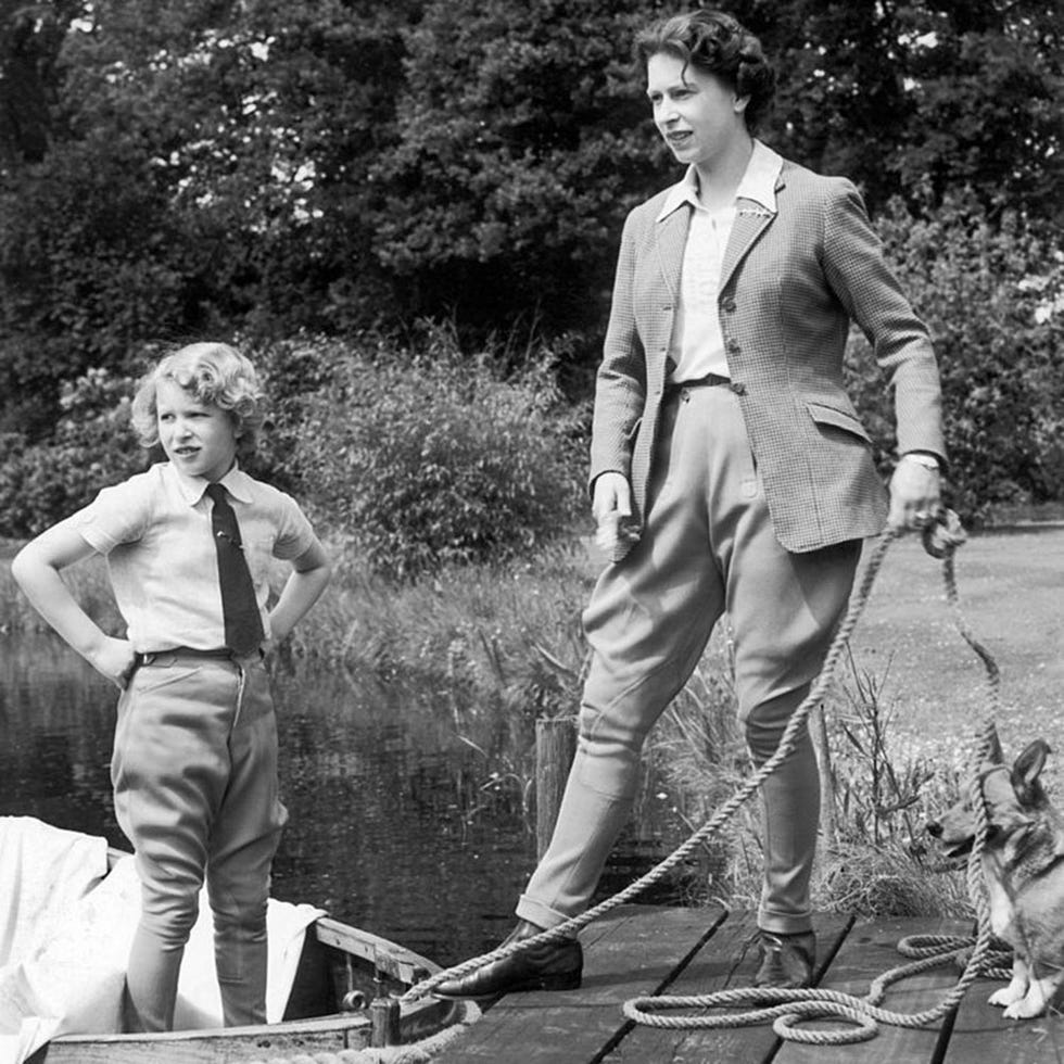 Human, Collar, Boats and boating--Equipment and supplies, Watercraft, Blazer, Carnivore, Suit, Suit trousers, Paddle, Vintage clothing, 