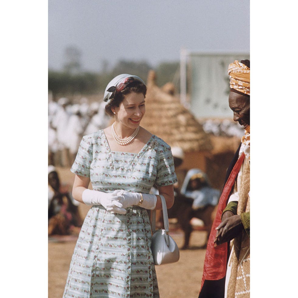 Jewellery, Dress, Fashion accessory, Headgear, Necklace, Street fashion, One-piece garment, Tradition, Day dress, Headpiece, 
