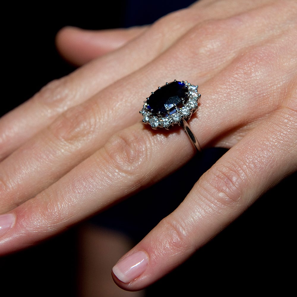 Ring, Jewellery, Engagement ring, Finger, Fashion accessory, Wedding ring, Gemstone, Hand, Wedding ceremony supply, Nail, 
