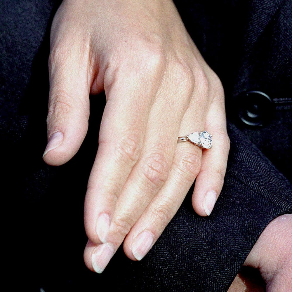 Finger, Ring, Hand, Engagement ring, Nail, Jewellery, Diamond, Wedding ring, Fashion accessory, Wedding ceremony supply, 