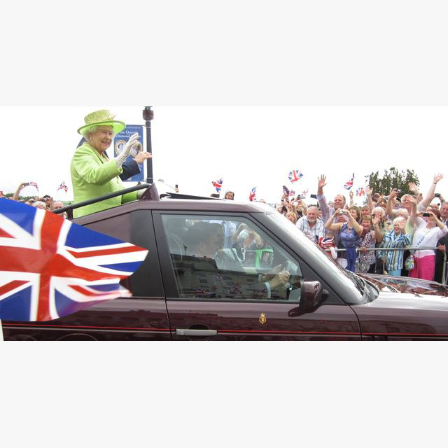 Motor vehicle, Vehicle, Car, Parade, Crowd, Public event, Automotive exterior, Flag, Festival, Event, 
