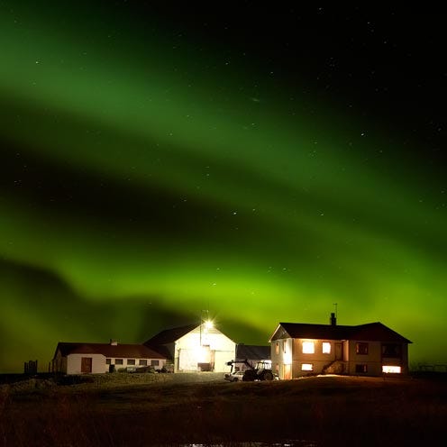 Aurora, Green, Night, Landscape, House, Atmospheric phenomenon, Space, Home, Roof, Rural area, 