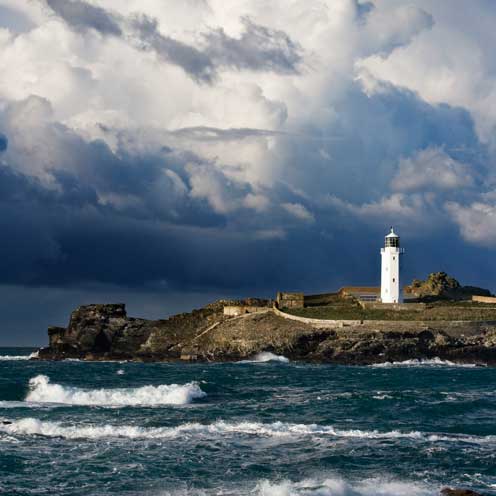 Body of water, Coastal and oceanic landforms, Tower, Cloud, Water, Coast, Ocean, Beacon, Sea, Promontory, 