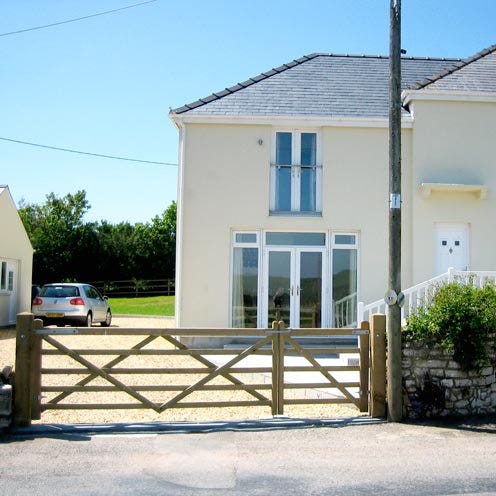 Property, Residential area, House, Real estate, Home, Building, Land lot, Roof, Door, Fixture, 